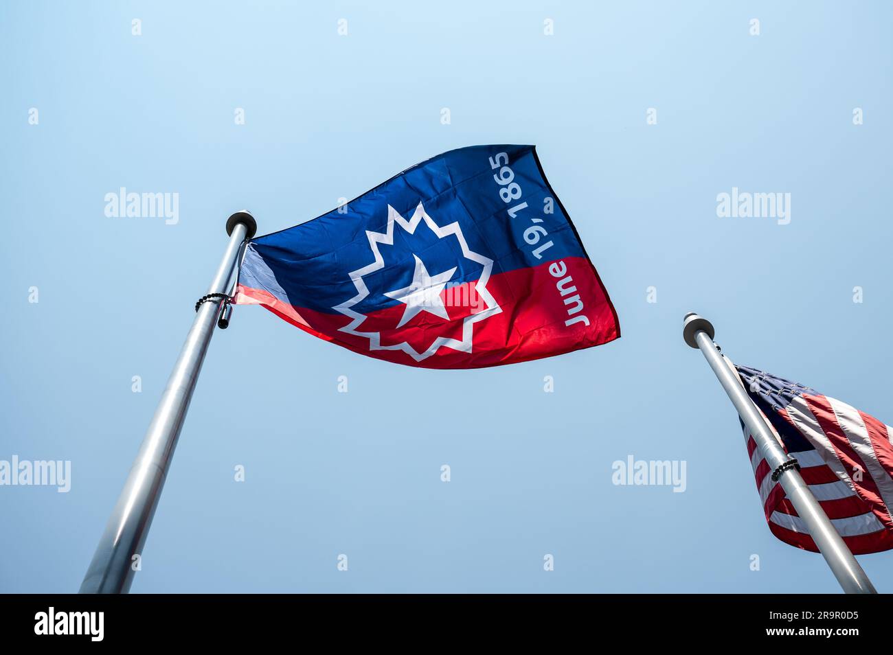 NASA HQ Juneteenth Flag Raising Ceremony. The Juneteenth flag is seen waving in the wind during a flag raising ceremony in recognition and celebration of Juneteenth, Thursday, June 15, 2023, at the Mary W. Jackson NASA Headquarters building in Washington. Stock Photo