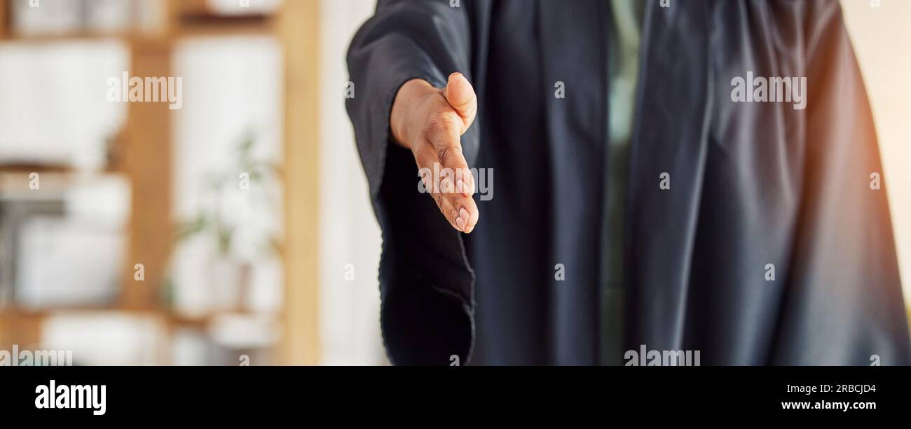 Judge, handshake and lawyer in thank you for greeting, meeting or partnership at attorney office. Person, graduate or jury shaking hands for Stock Photo