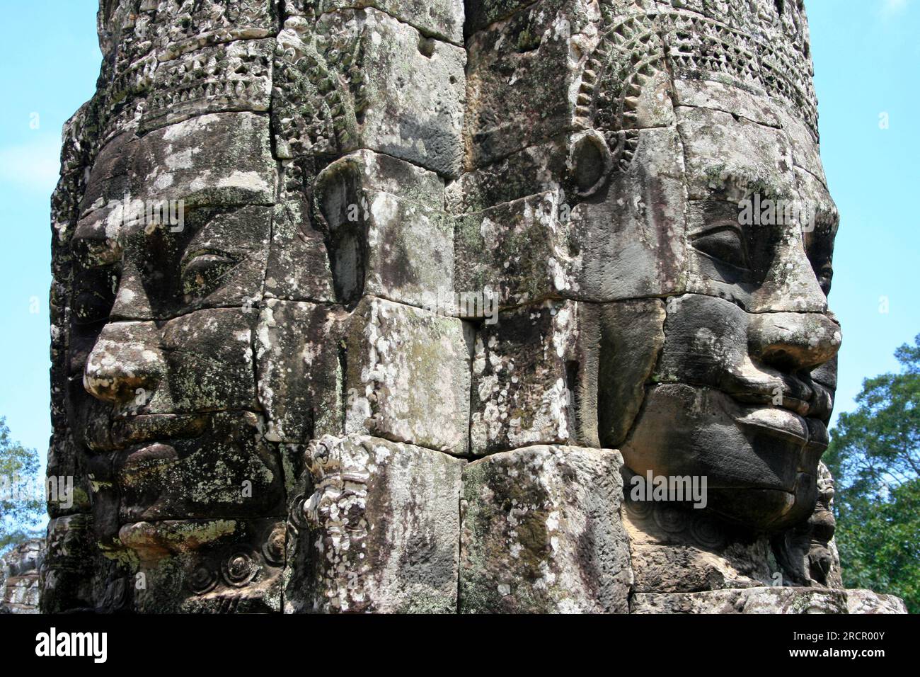 Details of two khmer faces in Angkor Thom. Stock Photo