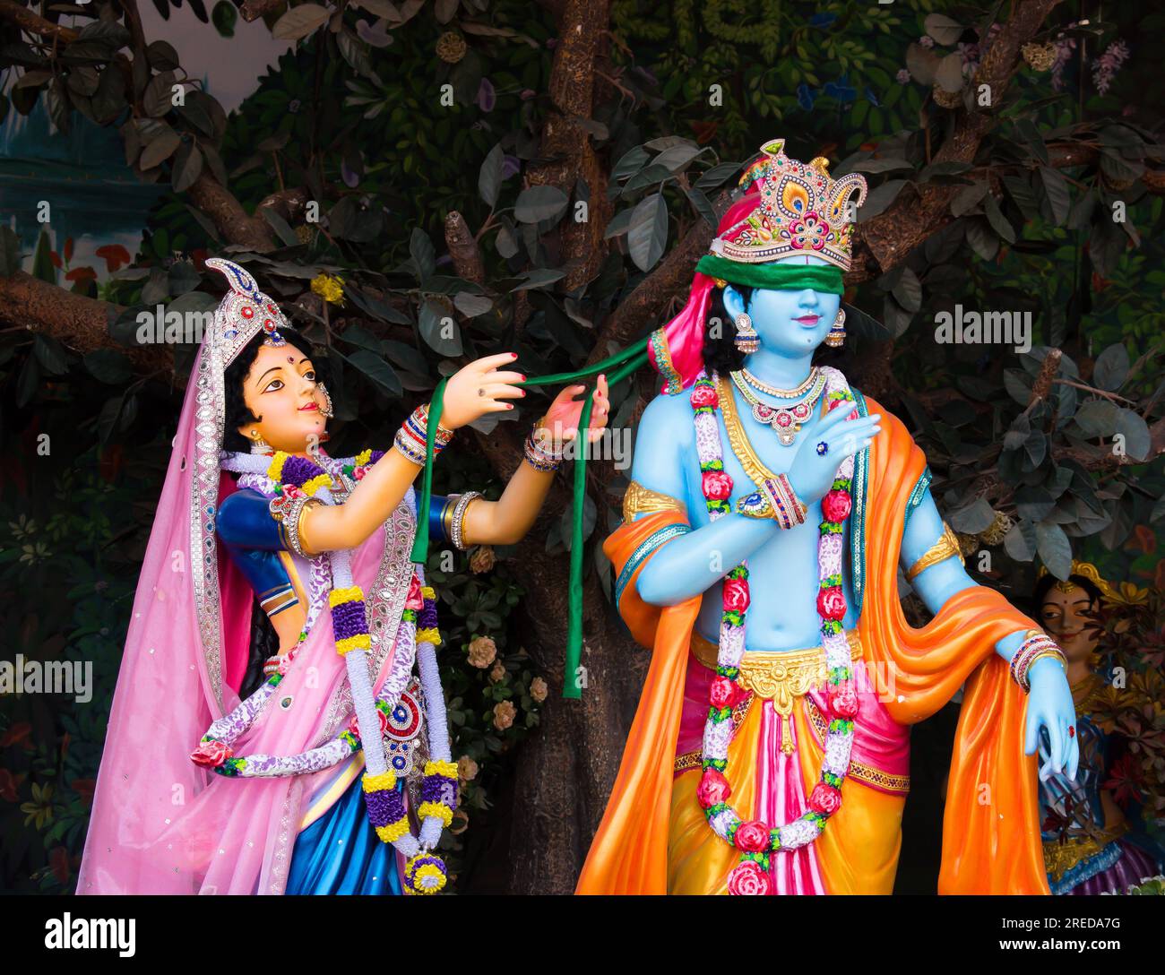 Colorful life size idols of Krishna, Radha at Prem Mandir temple. Happy Krishna Janmashtami. selective focus on subject. Stock Photo