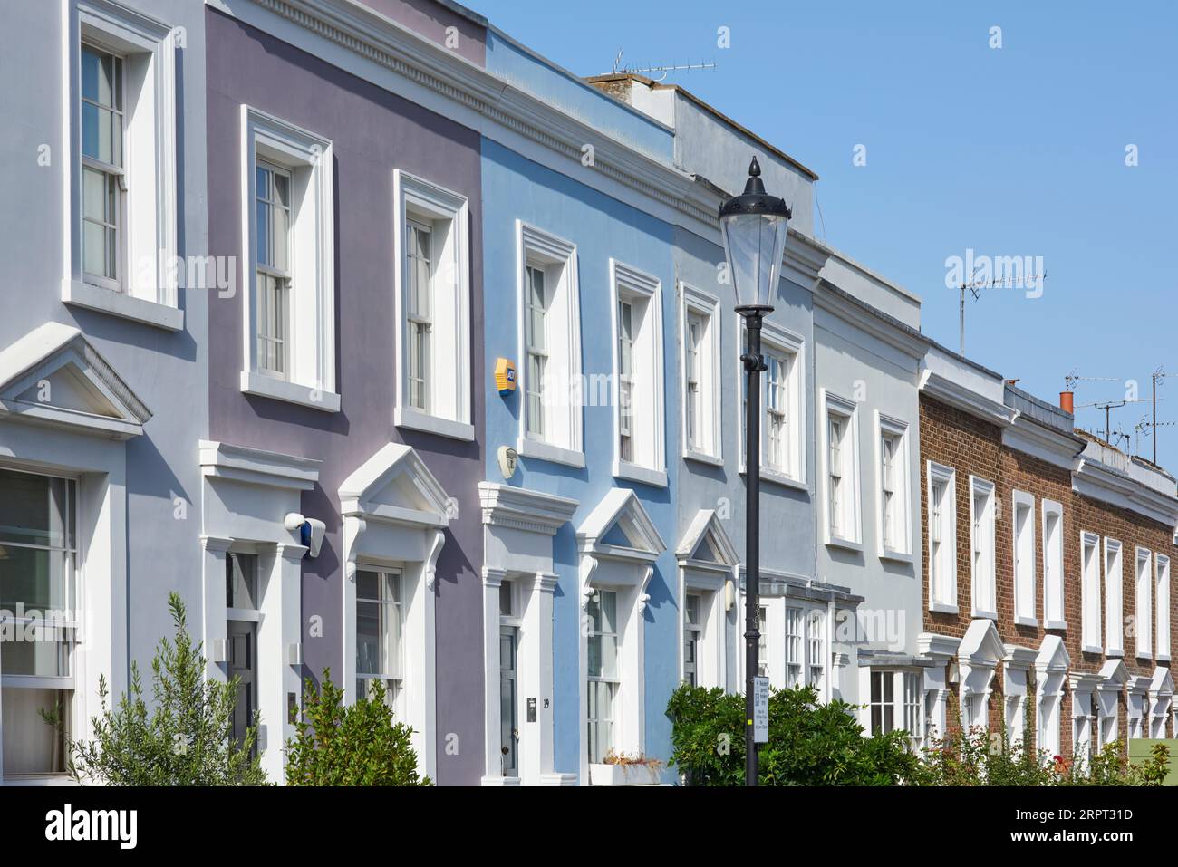 Colourful terraced houses in Kensington Place, Notting Hill, West London UK Stock Photo