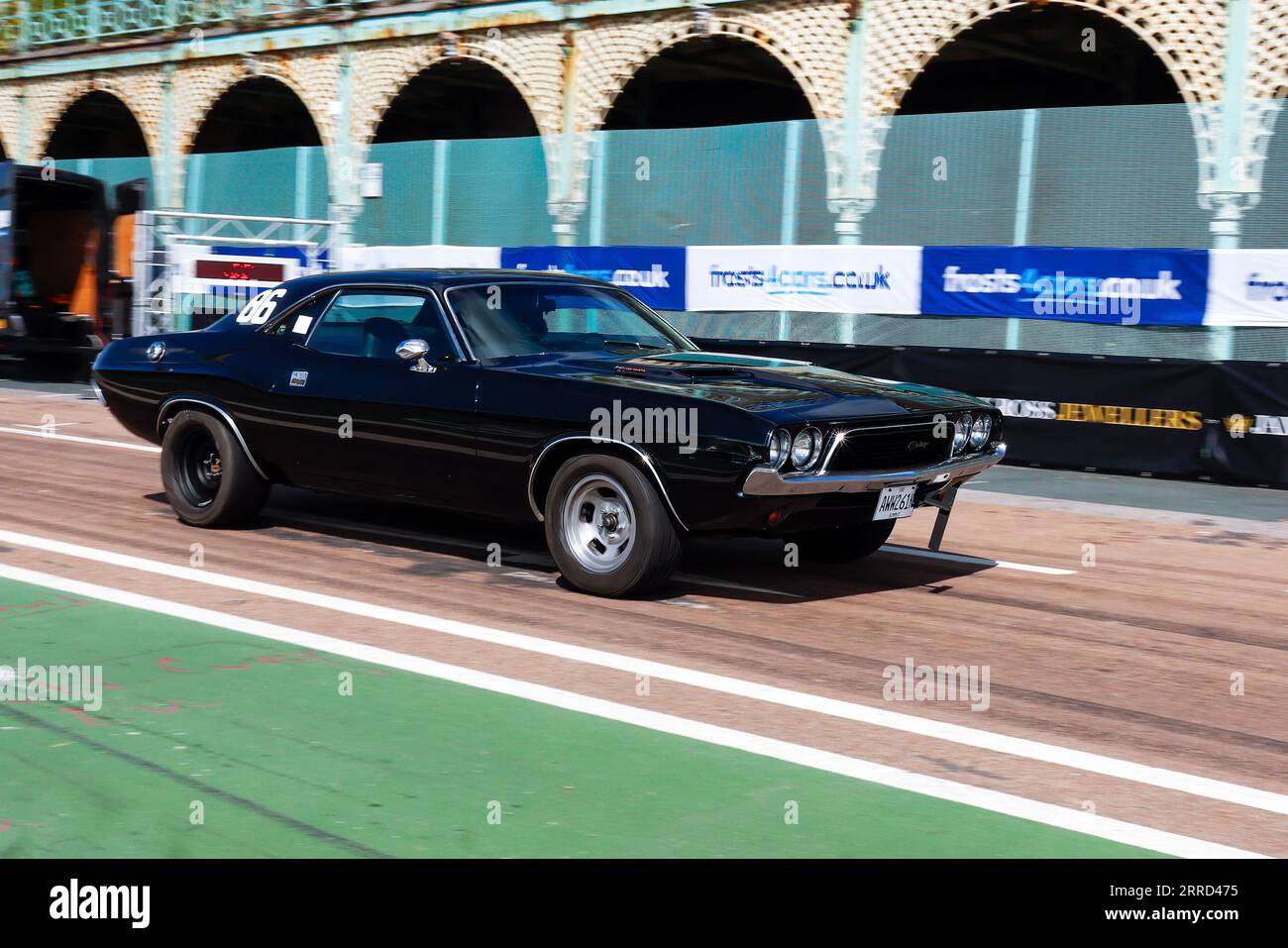 Madeira Drive, Brighton, City of Brighton & Hove, East Sussex UK. The Frosts Brighton Speed Trials is an exhilarating, action-packed day for spectators and participants alike. Over one hundred cars line up to take a timed run down Madeira Drive.  Numerous categories including road cars & race cars compete to win the fastest in their class along a quarter mile straight. This image features Adam Le Roy driving a Dodge Challenger. 2nd September 2023 Stock Photo