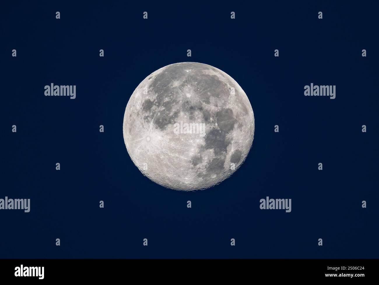 A full moon with exquisite surface details with dark blue background. Texas, USA. Stock Photo