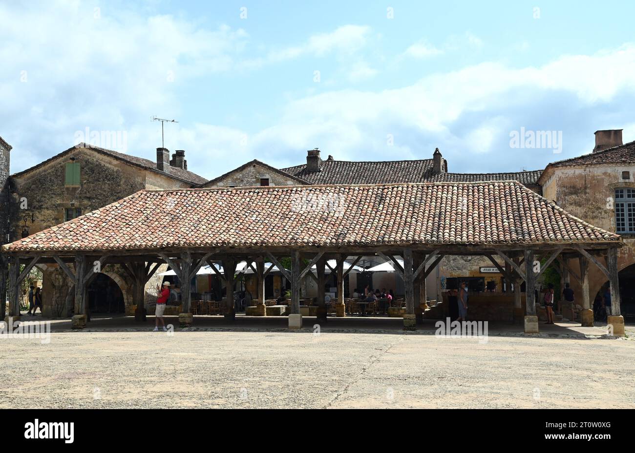 The market square area of the Bastide village of Monpazier in the Dordogne region of France. The bastide was founded in 1284 by Edward1 of England. Stock Photo