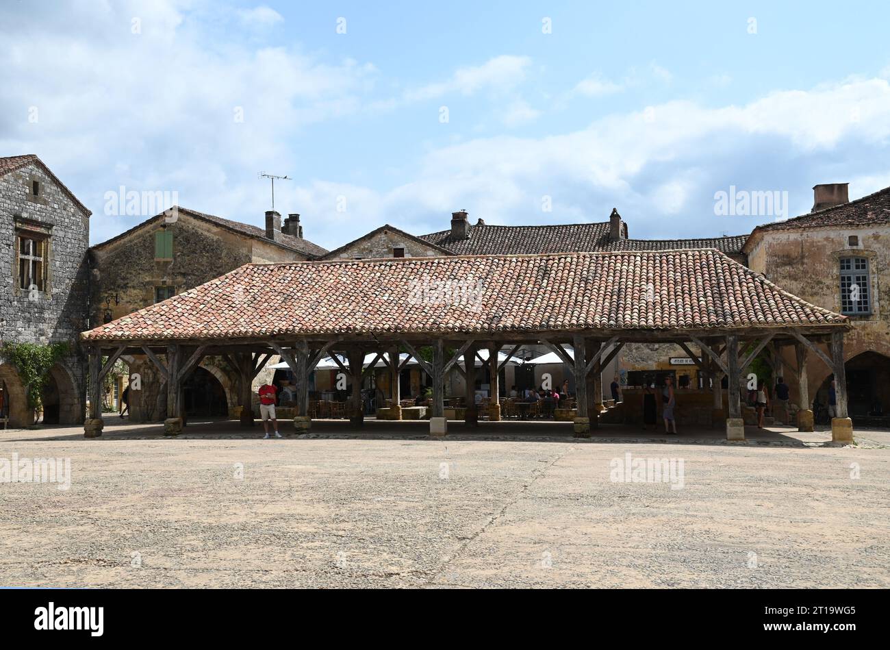 The market square area of the Bastide village of Monpazier in the Dordogne region of France. The bastide was founded in 1284 by Edward1 of England. Stock Photo