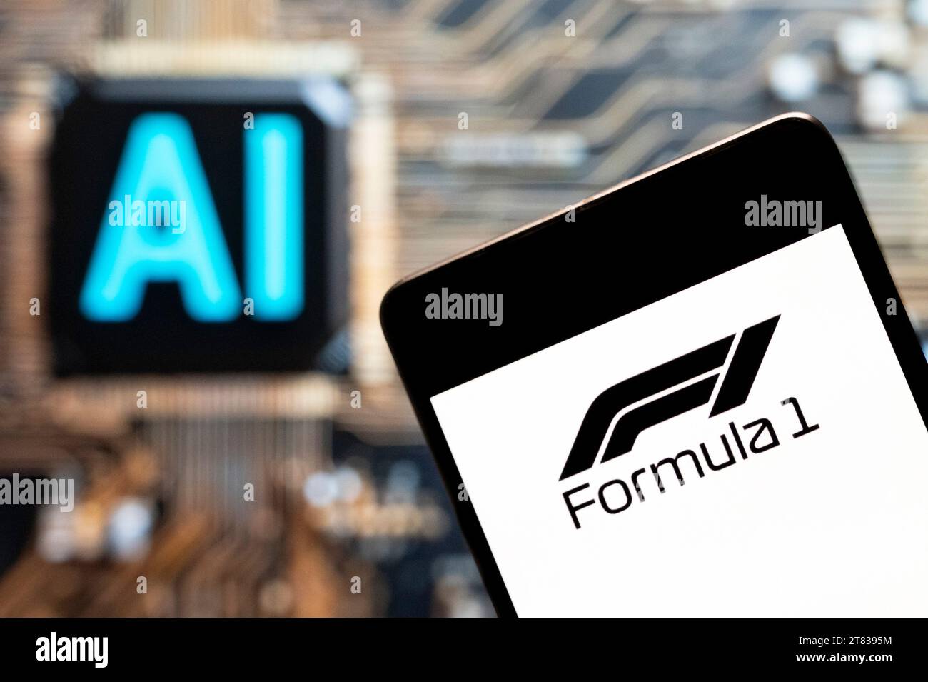 In this photo illustration, the Fédération Internationale de l'Automobile (FIA), Formula 1 (F1), logo seen displayed on a smartphone with an Artificial intelligence (AI) chip and symbol in the background. (Photo by Budrul Chukrut / SOPA Images/Sipa USA) *** Strictly for editorial news purposes only *** Stock Photo