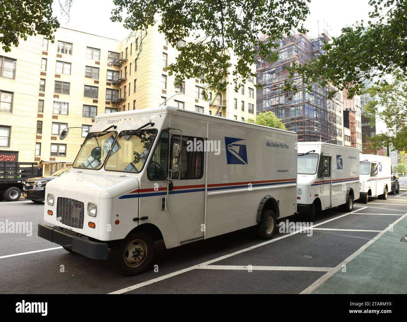 New York, USA - June 9, 2018: The cars of United States Postal Service (USPS) on the street of New York. Stock Photo