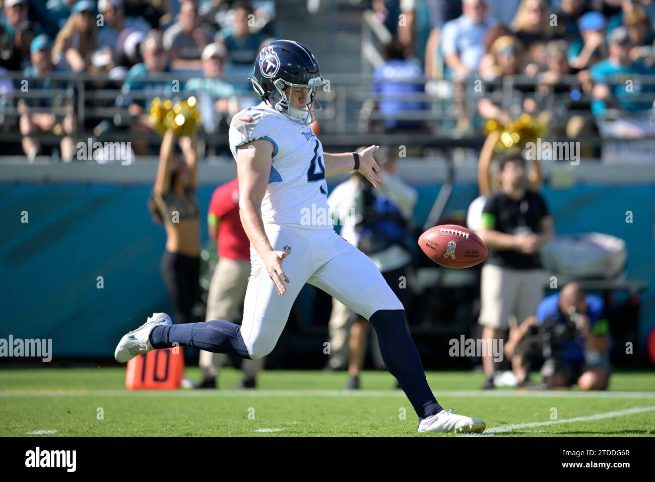 Tennessee Titans punter Ryan Stonehouse (4) kicks the ball away during ...