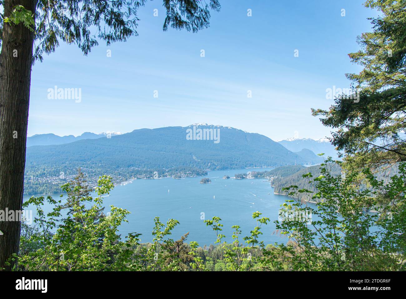 View of Burrard Inlet from Burnaby Mountain Park (Burnaby Mountain Conservation Area) in sunny day. Stock Photo