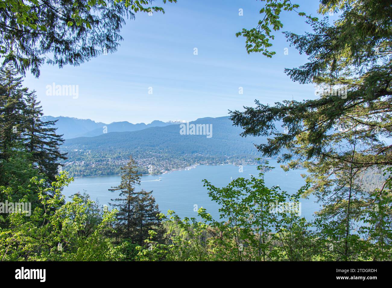 View of Burrard Inlet from Burnaby Mountain Park (Burnaby Mountain Conservation Area) in sunny day. Stock Photo