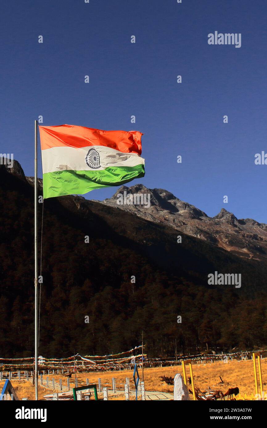 indian flag is flying over the sky near india china border (mcmahon line) in tawang area of arunachal pradesh, north east india Stock Photo