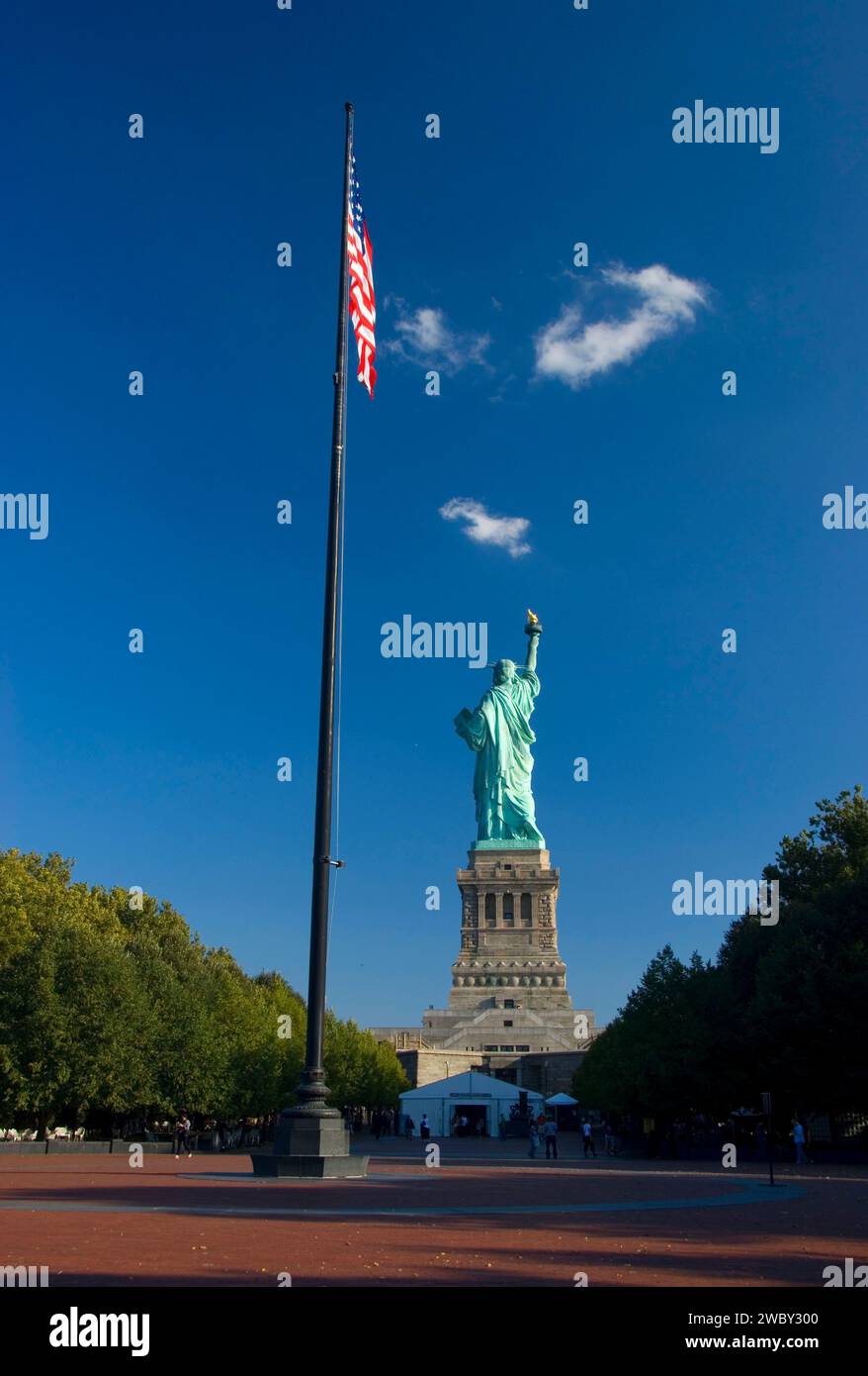 Statue of Liberty with American flag, Statue of Liberty National Monument, New York Stock Photo