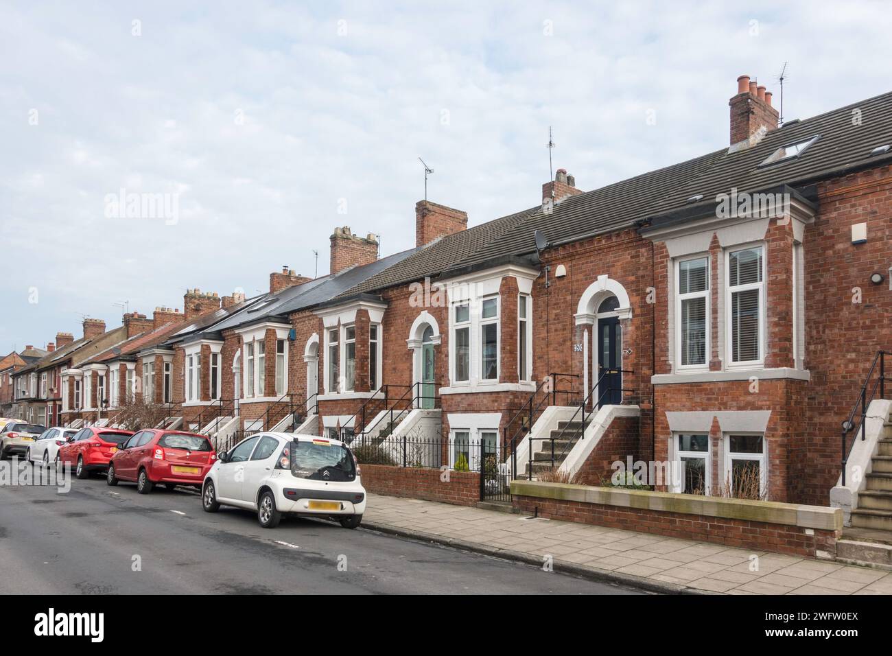 Unusual split level Victorian terraced houses in Victoria Terrace, Whitley Bay, North East England, UK Stock Photo