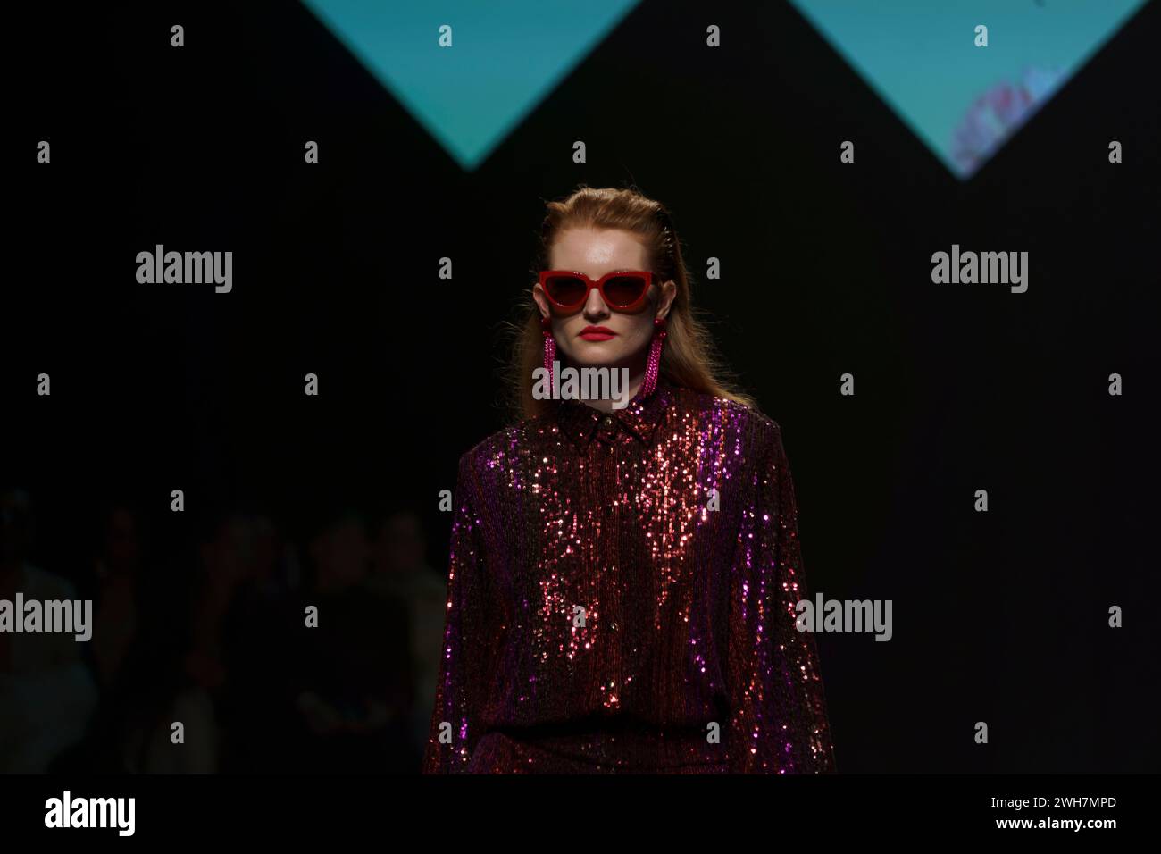 Models show collections by designer Marcel  Ostertag on the catwalk at the Verti Music Hall Stock Photo