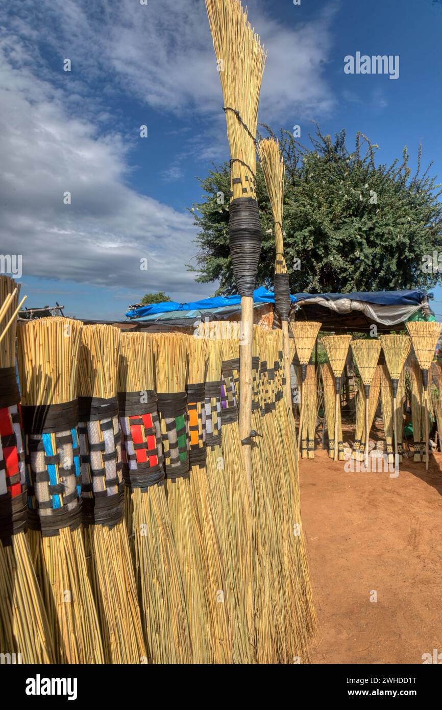 african brooms, street vendor small stall at the side of the highway Stock Photo