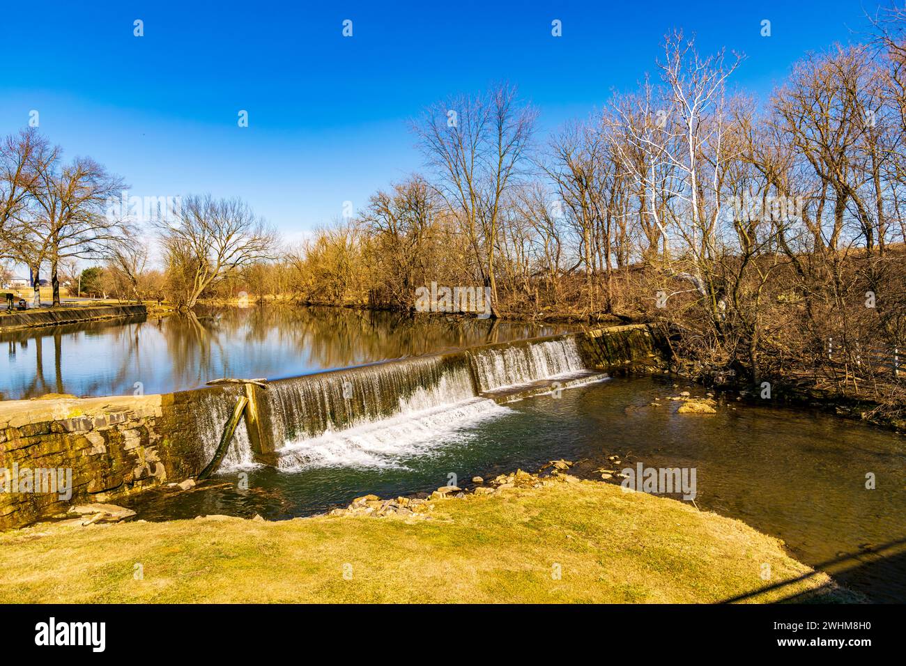 View of a Man Made Waterfall Dam for Operation of a Old Grist Mill Stock Photo