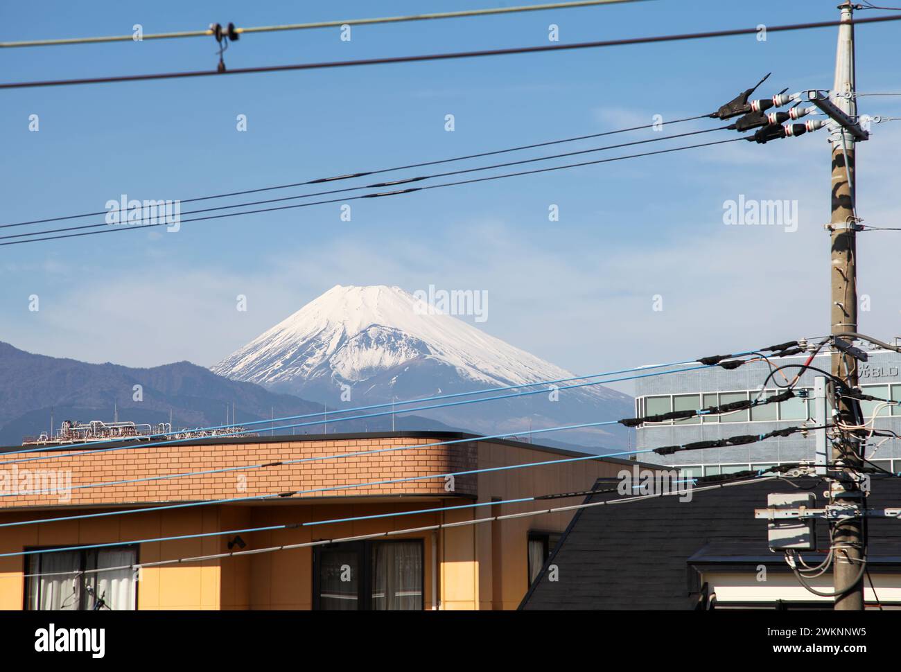 View of Mt. Fuji from a station platform at Mishima Station in Shizuoka, Japan. Stock Photo