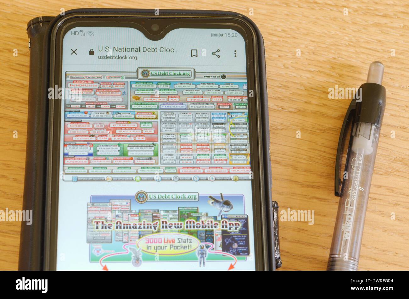 US National Debt Clock Website on a Smartphone Stock Photo