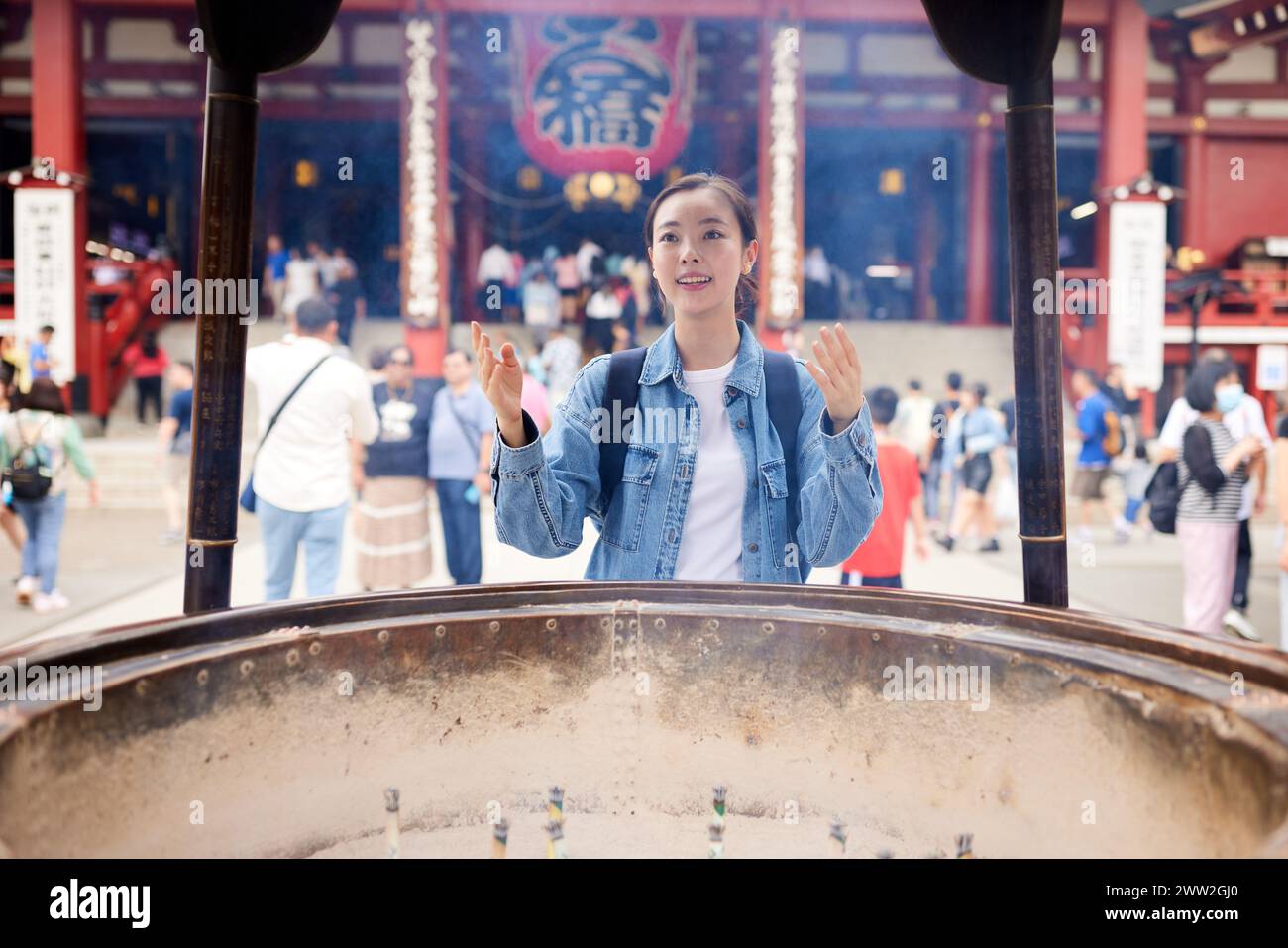 Asian woman at the temple Stock Photo