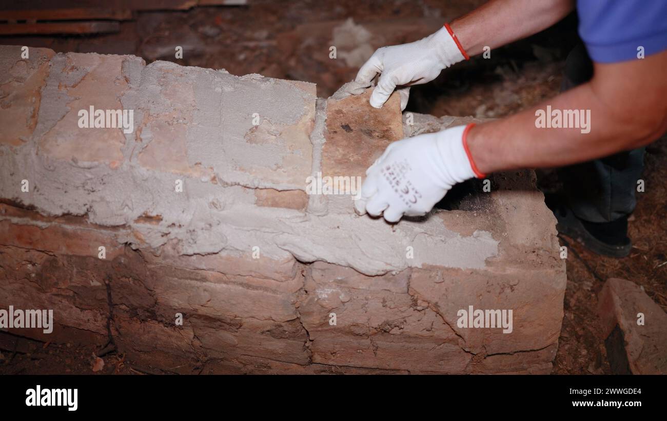 Reconstruction of the rustic furnace pipe. Stock Photo