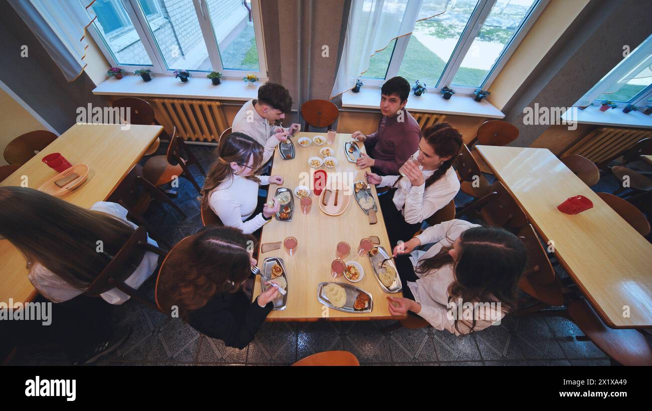 Children eating in the school cafeteria. Stock Photo