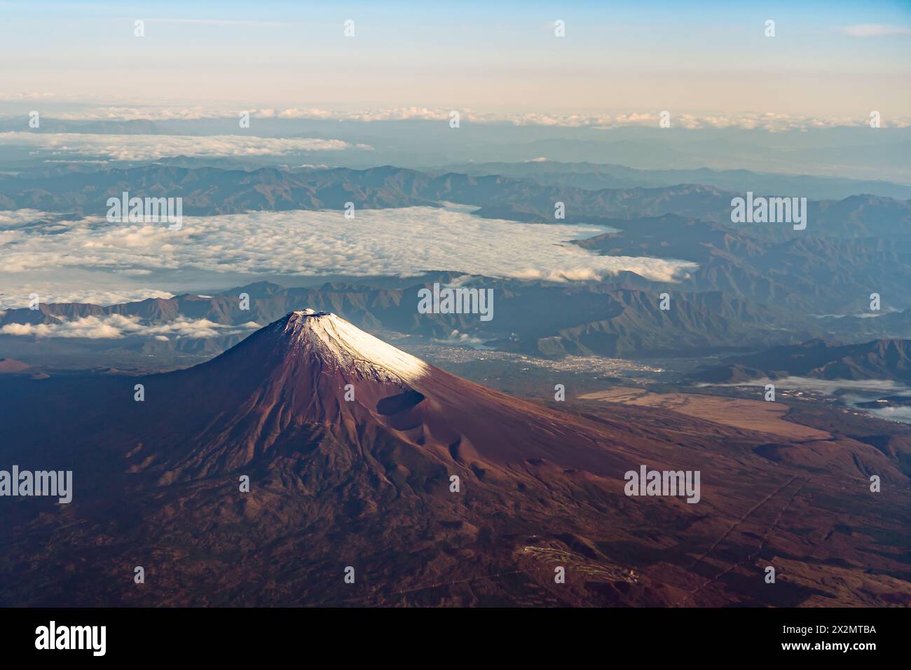 A birds eye view close-up the Mount Fuji ( Mt. Fuji ) and blue sky. Scenery landscapes of the Fuji-Hakone-Izu National Park. Shizuoka, Japan Stock Photo