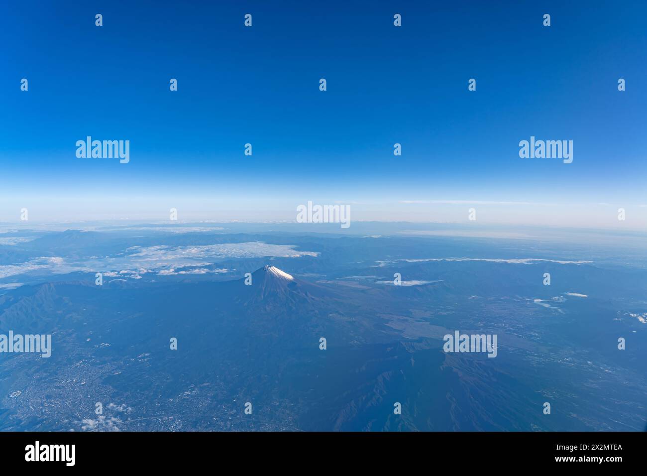 A birds eye view close-up the Mount Fuji ( Mt. Fuji ) and blue sky. Scenery landscapes of the Fuji-Hakone-Izu National Park. Shizuoka, Japan Stock Photo