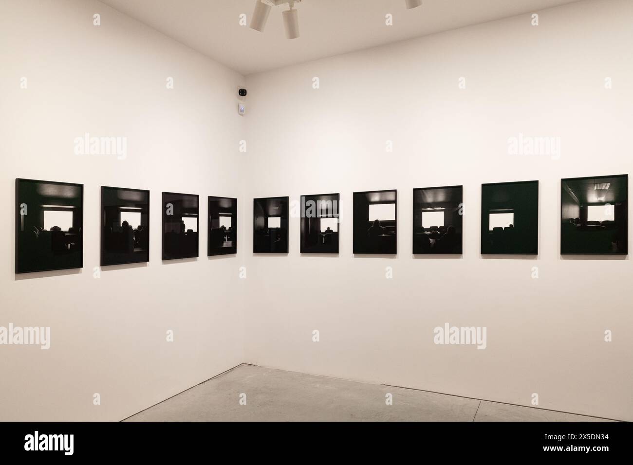 Venice, Italy - April 17, 2024: The photos of Dean Sameshima titled being alone exposed at the Central Pavilion during the 60th International Art exhi Stock Photo