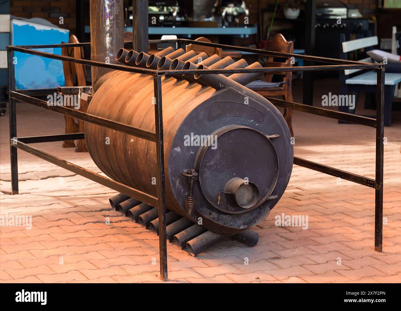 Potbelly stove a cast-iron, coal-burning or wood-burning stove in Russia Stock Photo