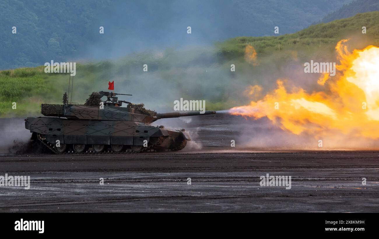 Gotemba, Japan. 26th May, 2024. Japan Ground Self-Defense Force's Type 10 tanks fires during the live-firing exercise 'Fuji Comprehensive Firepower Exercise 2024' at the Higashi Fuji training field in Shizuoka-prefecture, Japan on Sunday, May 26, 2024. Photo by Keizo Mori/UPI Credit: UPI/Alamy Live News Stock Photo