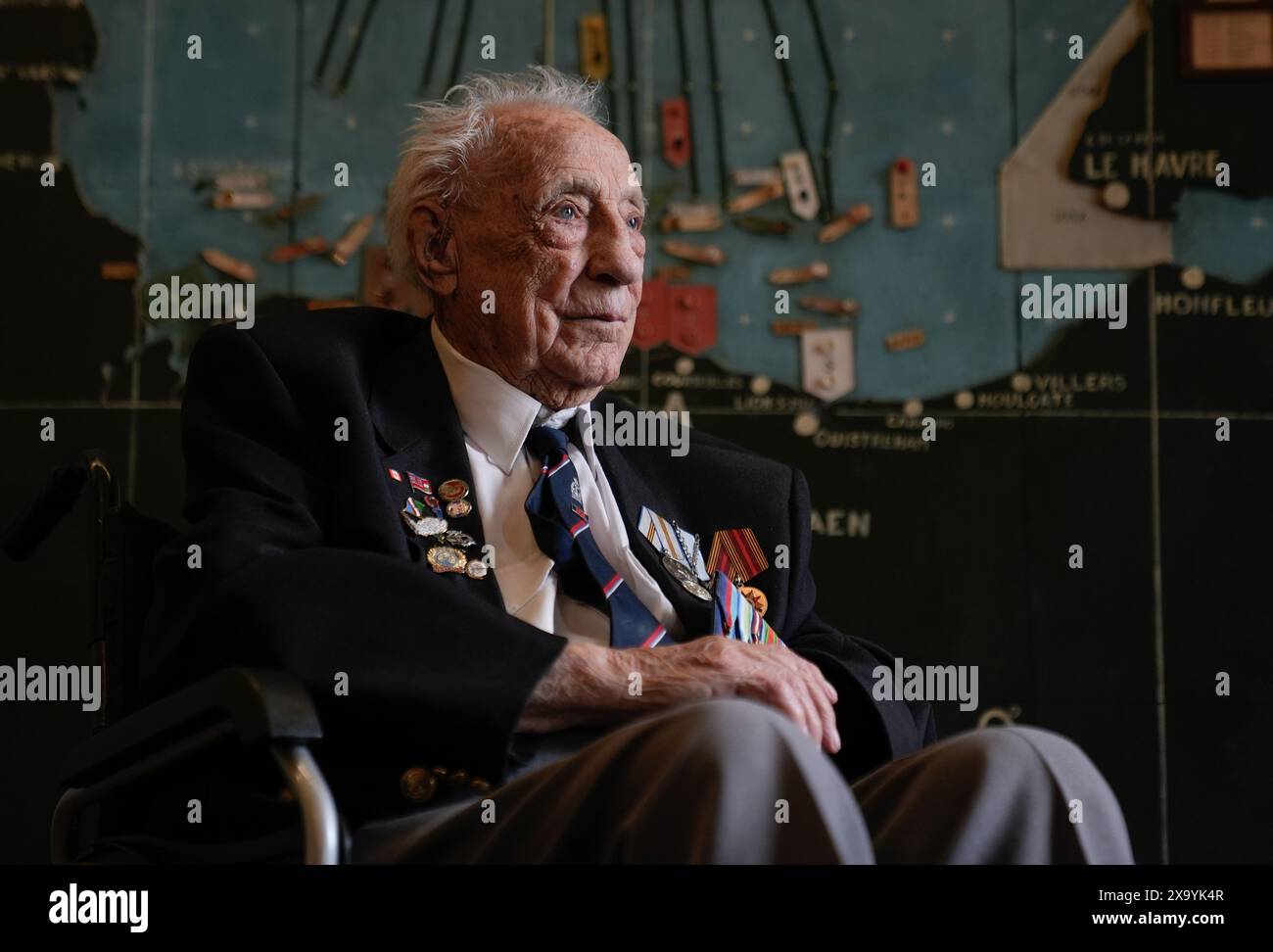 Normandy veteran Les Underwood, 98, poses for a photograph in the Map room at Southwick House, during an event hosted by the Spirit of Normandy Trust and D-Day Revisited at Southwick House, the nerve centre of D-Day operations 80 years ago, near Portsmouth, Hampshire. On Tuesday the veterans from D-Day and Normandy will travel by ferry to France to take part in commemorations to mark the 80th anniversary of D-Day on Thursday. Picture date: Monday June 3, 2024. Stock Photo