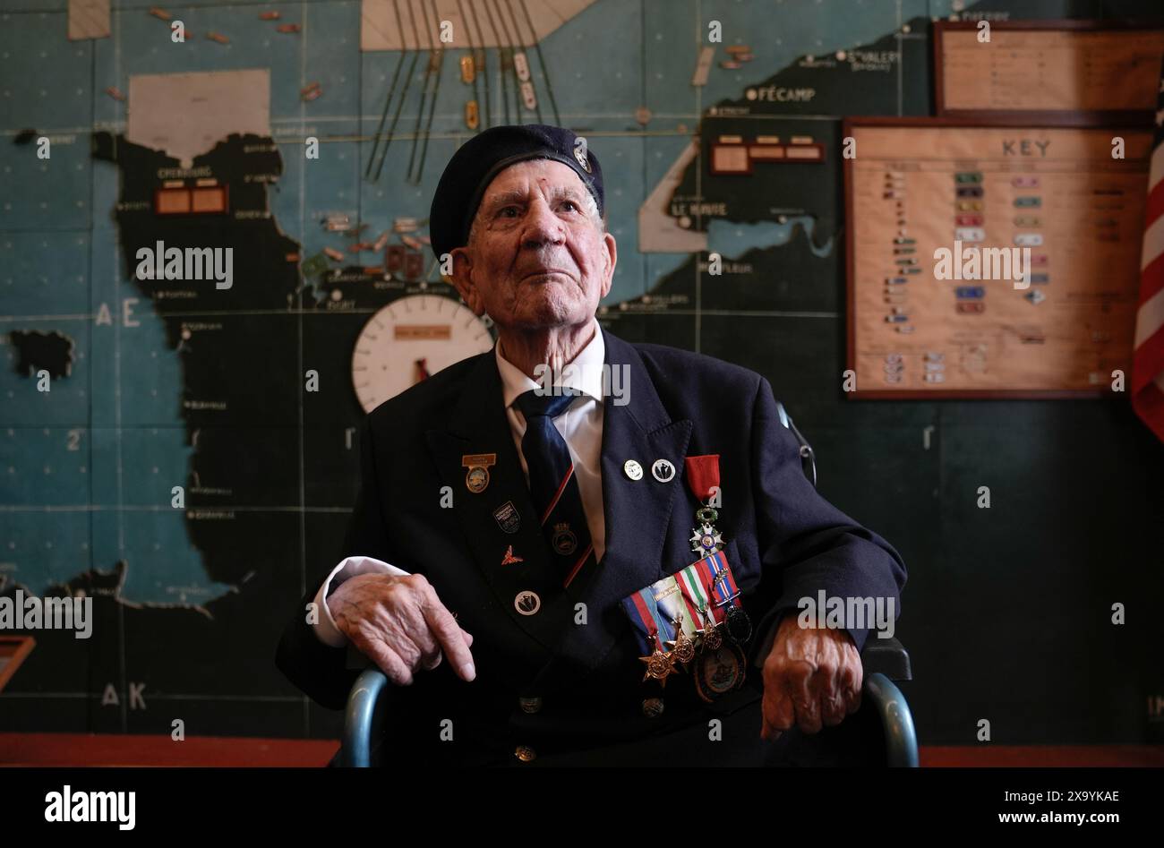 Normandy veteran George Chandler, 99, poses for a photograph in the Map room at Southwick House, during an event hosted by the Spirit of Normandy Trust and D-Day Revisited at Southwick House, the nerve centre of D-Day operations 80 years ago, near Portsmouth, Hampshire. On Tuesday the veterans from D-Day and Normandy will travel by ferry to France to take part in commemorations to mark the 80th anniversary of D-Day on Thursday. Picture date: Monday June 3, 2024. Stock Photo