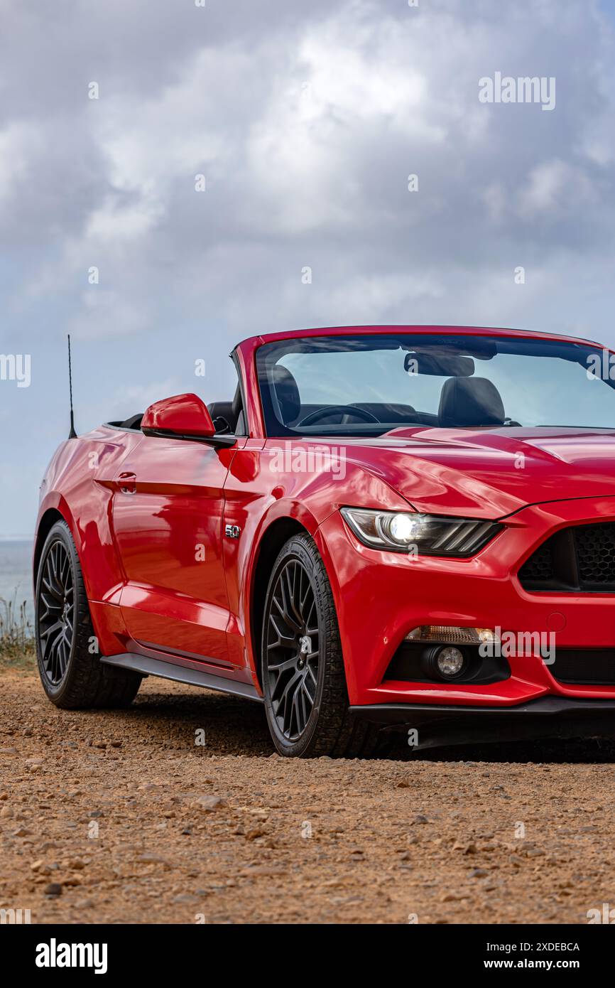 Red Ford Mustang sixth generation at countryside. S550, pony car. American Muscle Car. South Africa - 23 Oct 2023 Stock Photo