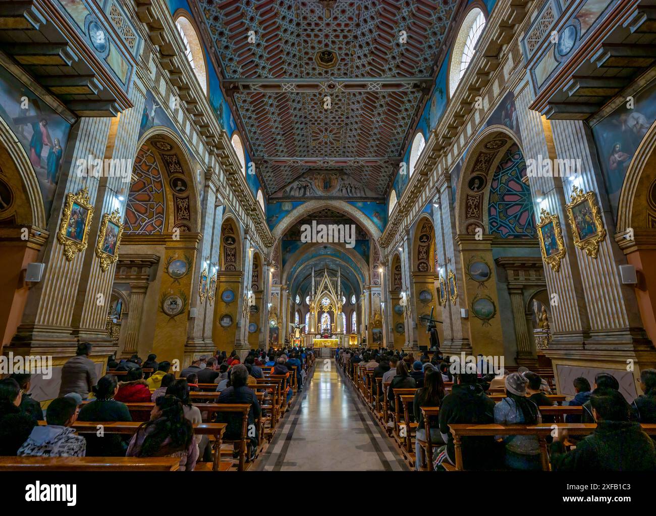 People attending Sunday mass at Santo Domingo Church with Mudjedar ...