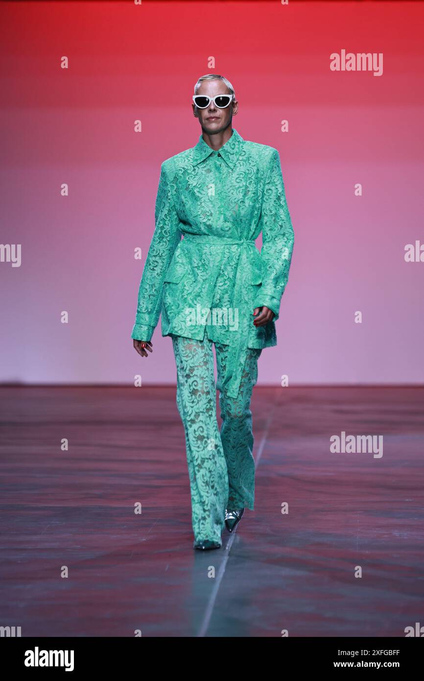 BERLIN, GERMANY - July 3th: A model walks the runway during the Marcel Ostertag Show as part of the COLLECTIVEFOUR at Uber Eats Music Hall on July 3th, 2025 in Berlin, Germany. Stock Photo