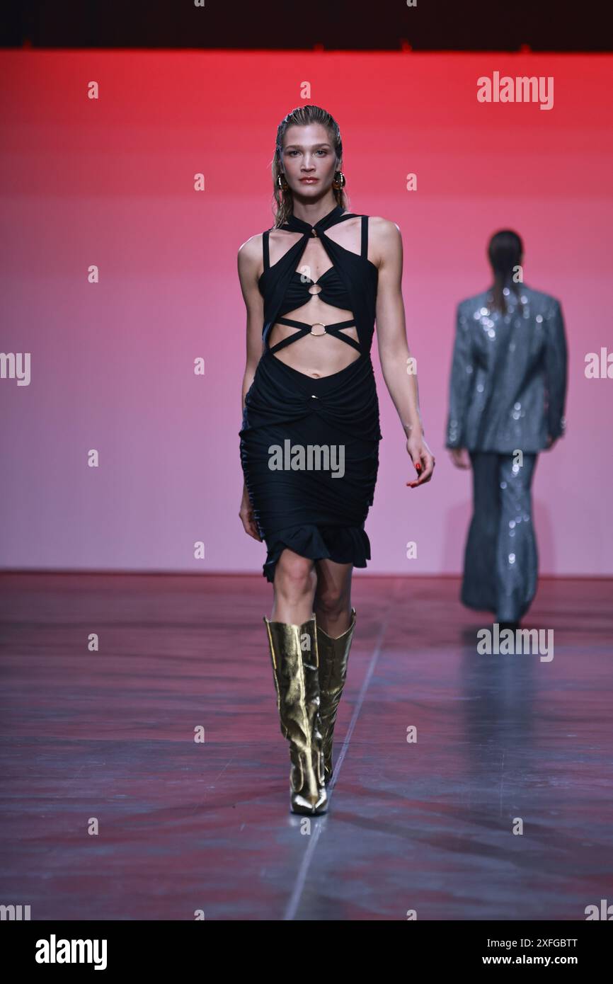 BERLIN, GERMANY - July 3th: A model walks the runway during the Marcel Ostertag Show as part of the COLLECTIVEFOUR at Uber Eats Music Hall on July 3th, 2025 in Berlin, Germany. Stock Photo