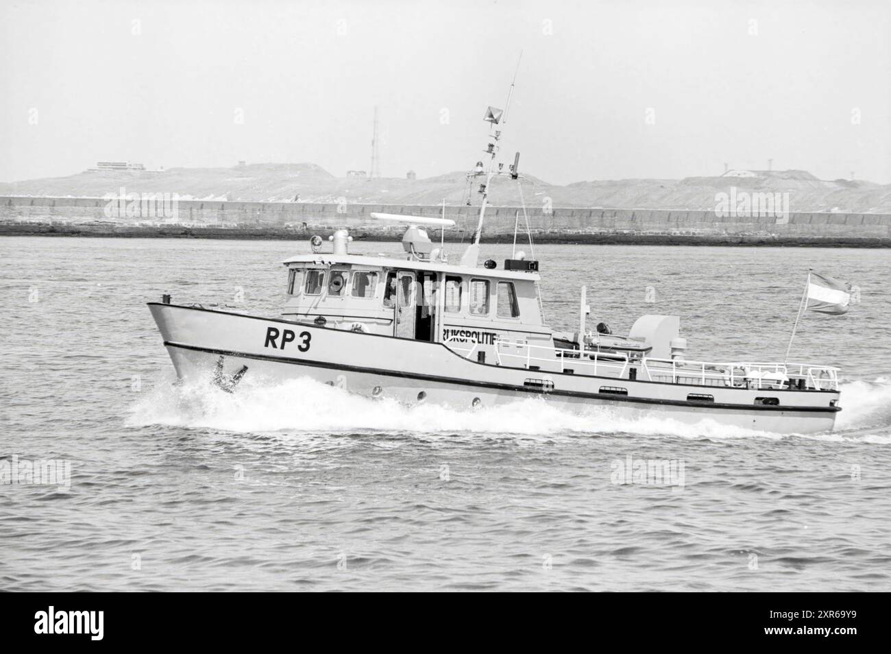 RP 3, National Police boat, IJmuiden, Police, Ships, IJmuiden, The Netherlands, 14-07-1983, Whizgle Dutch News: Historic Images Tailored for the Future. Explore The Netherlands past with modern perspectives through Dutch agency imagery. Bridging yesterday's events with tomorrow's insights. Embark on a timeless journey with stories that shape our future. Stock Photo