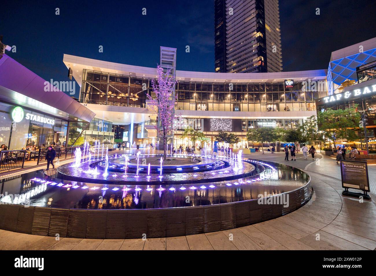 The Brentwood Place Mall, or The Amazing Brentwood main plaza on a summer evening with stores and shoppers.  Burnaby BC, near Vancouver, Canada. Stock Photo