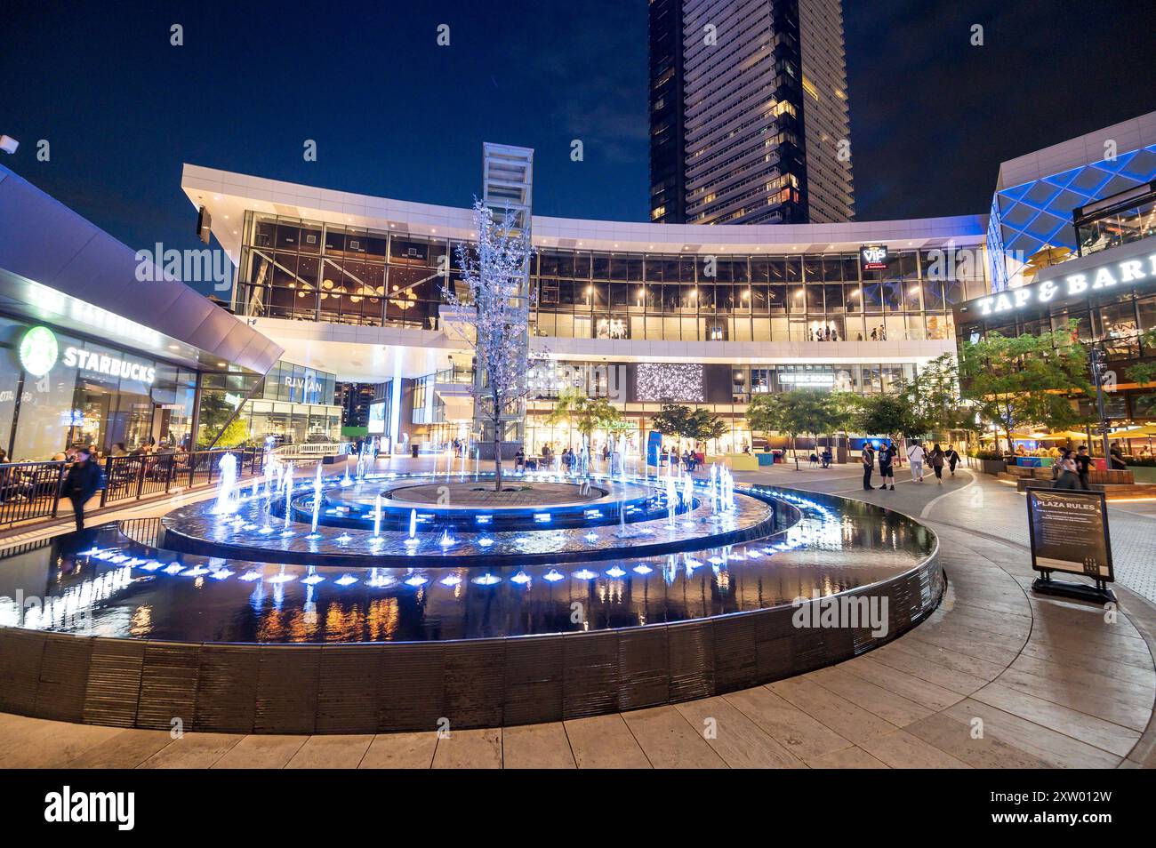 The Brentwood Place Mall, or The Amazing Brentwood main plaza on a summer evening with stores and shoppers.  Burnaby BC, near Vancouver, Canada. Stock Photo