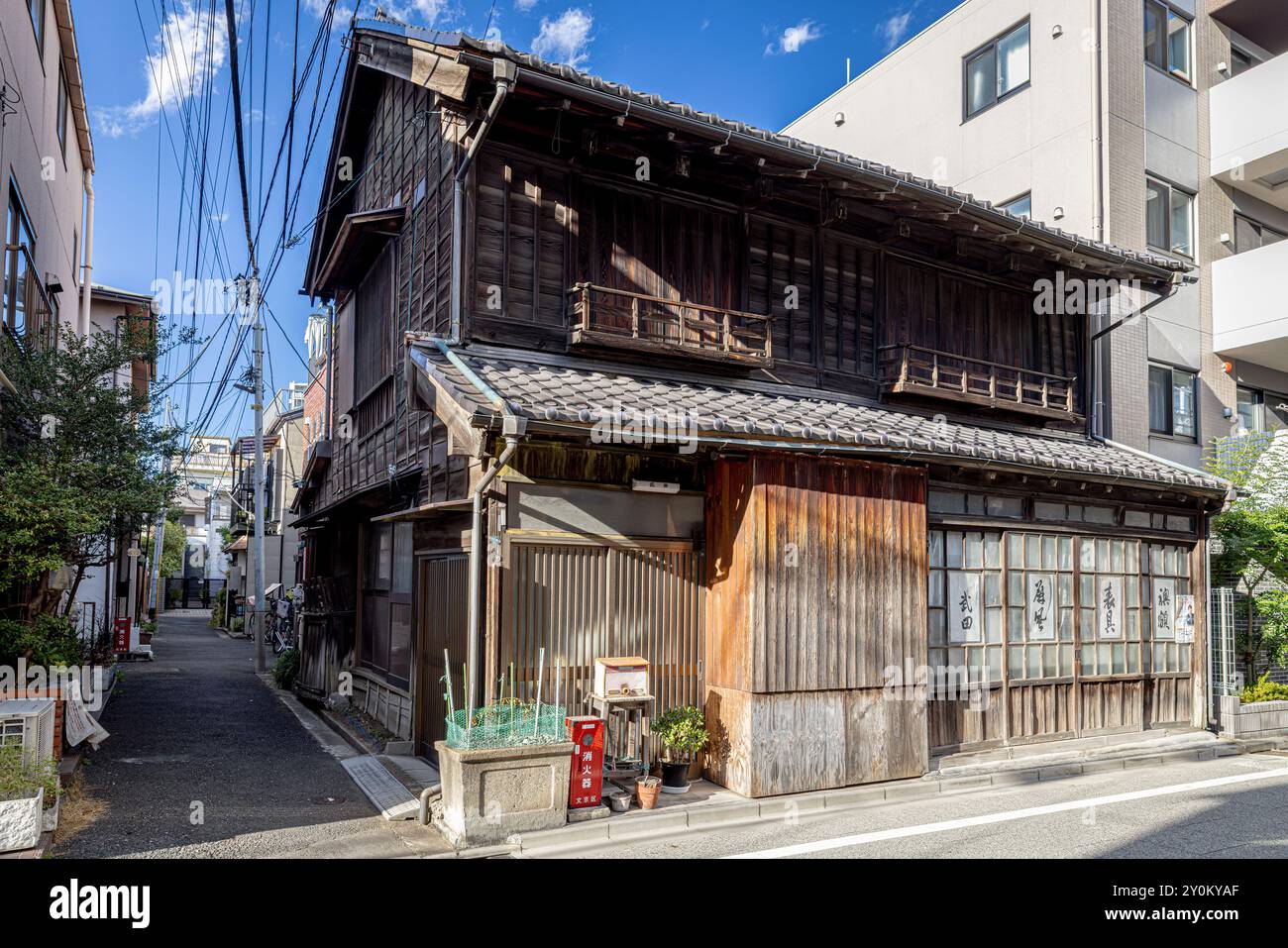 Traditional weathered japanese minka house  street in japan Stock Photo