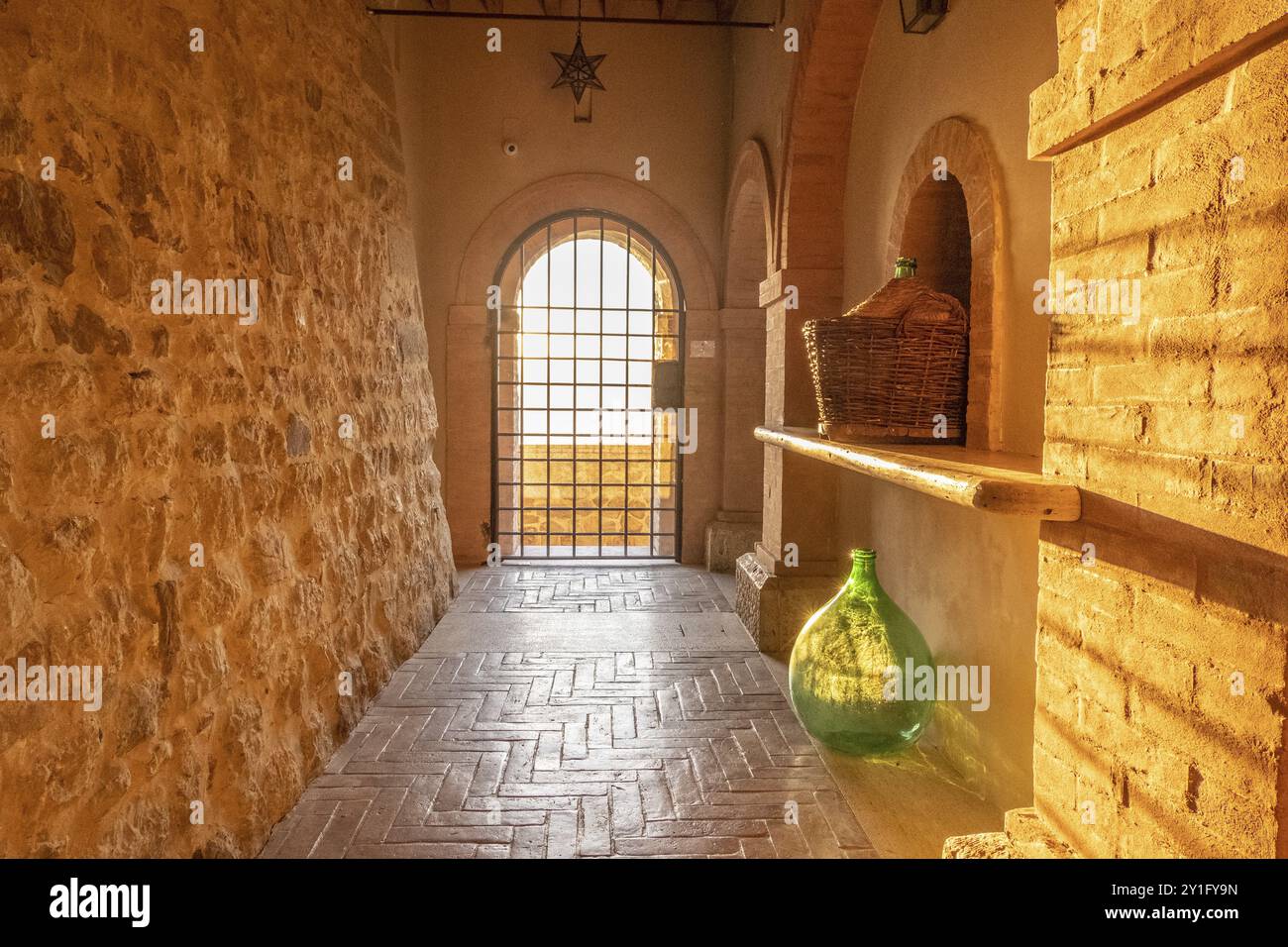 Beautiful sun light inside of an ancient castle near Montalcino, Tuscany, Italy. Old stone medieval castle Stock Photo