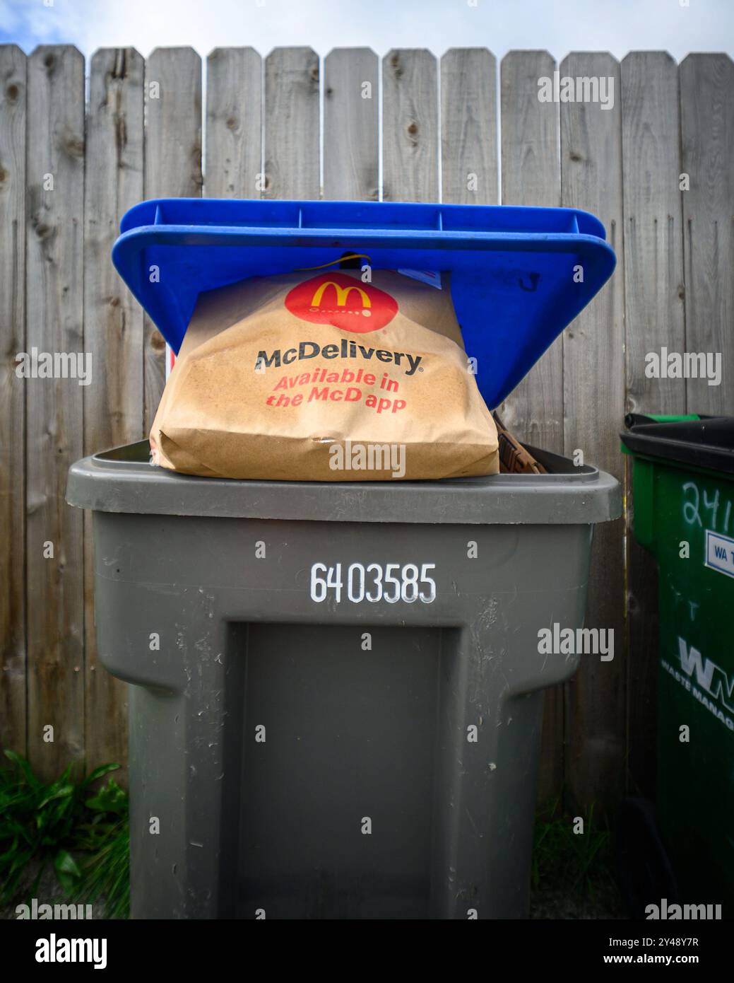 A trash bin in a nalley Stock Photo