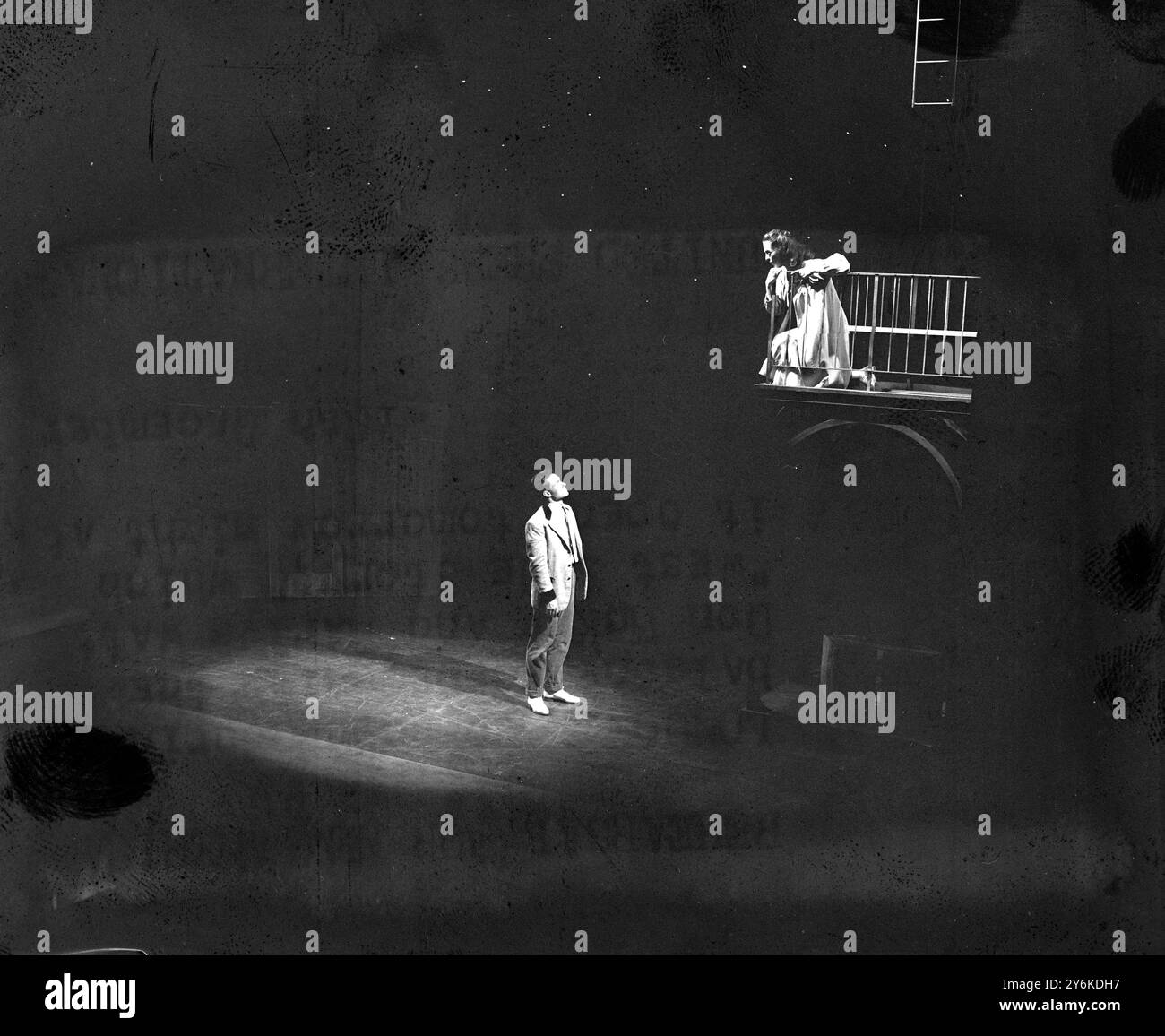 A scene during rehearsal for the balcony scene with the two principal leads on stage - DON McKAY and MARLYS WATTIS in the new American musical WEST SIDE STORY - 10th December 1958. ©TopFoto Stock Photo