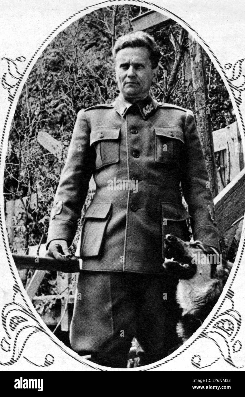 Marshal Tito at his mountain headquarters. A heroic leader of the Yugoslav Partisans. With him is his favourite pet, a German police dog who answers to the name of Tiger. June 1944      Tito, Josip Broz, Marshal (orig. Josip Broz) Croatian Yugoslavian dictator, general, and Communist politician; 1st secretary-general of Yugoslavian Communist Party 1936-1980; prime minister of Yugoslavia 1945-1953; president of Yugoslavia 1953-1980; leader in Non-Aligned Movement  1892-1980       ©2004 Topfoto Stock Photo