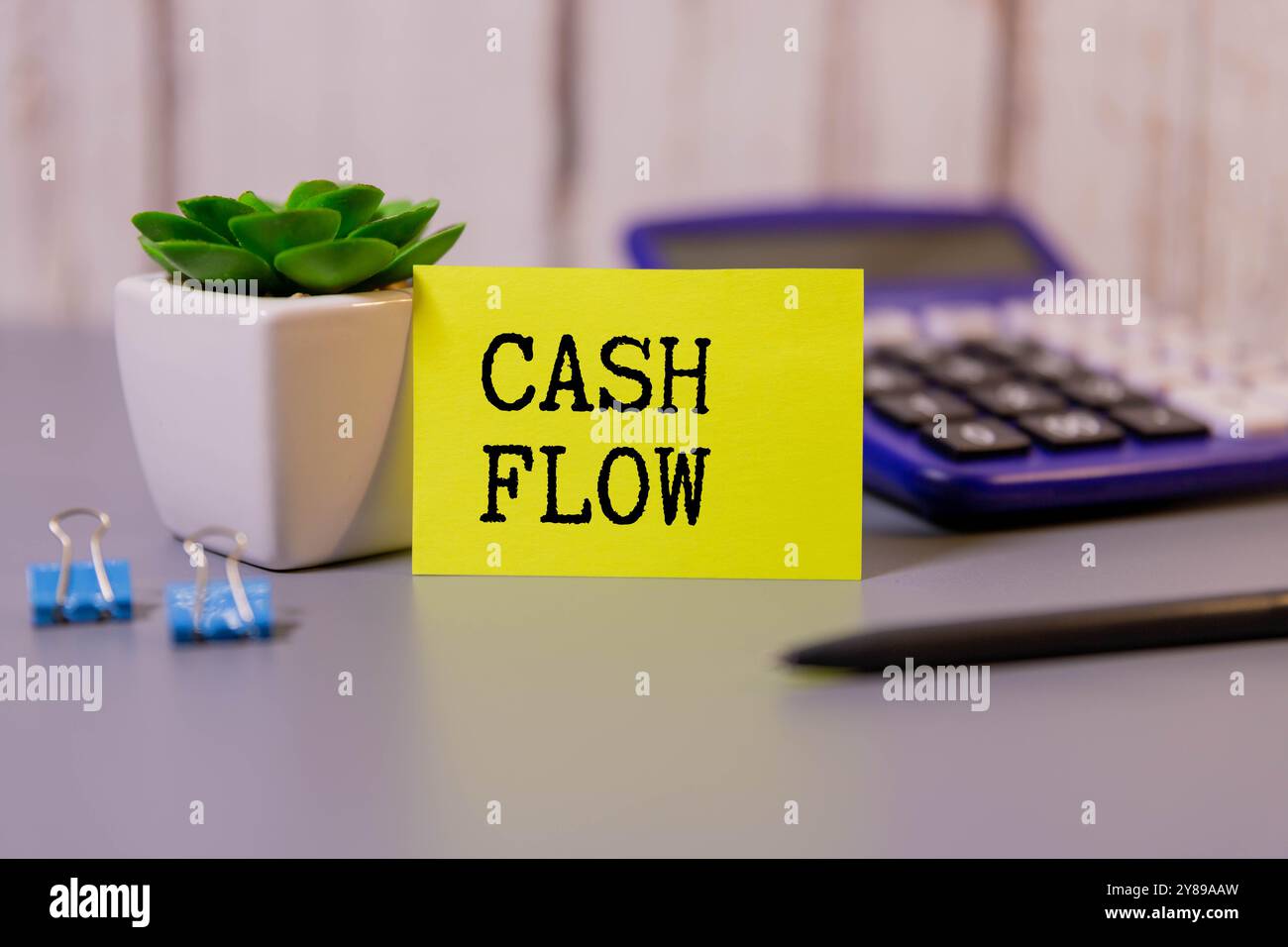 text Cash Flow on white business card. Business conceptual Stock Photo