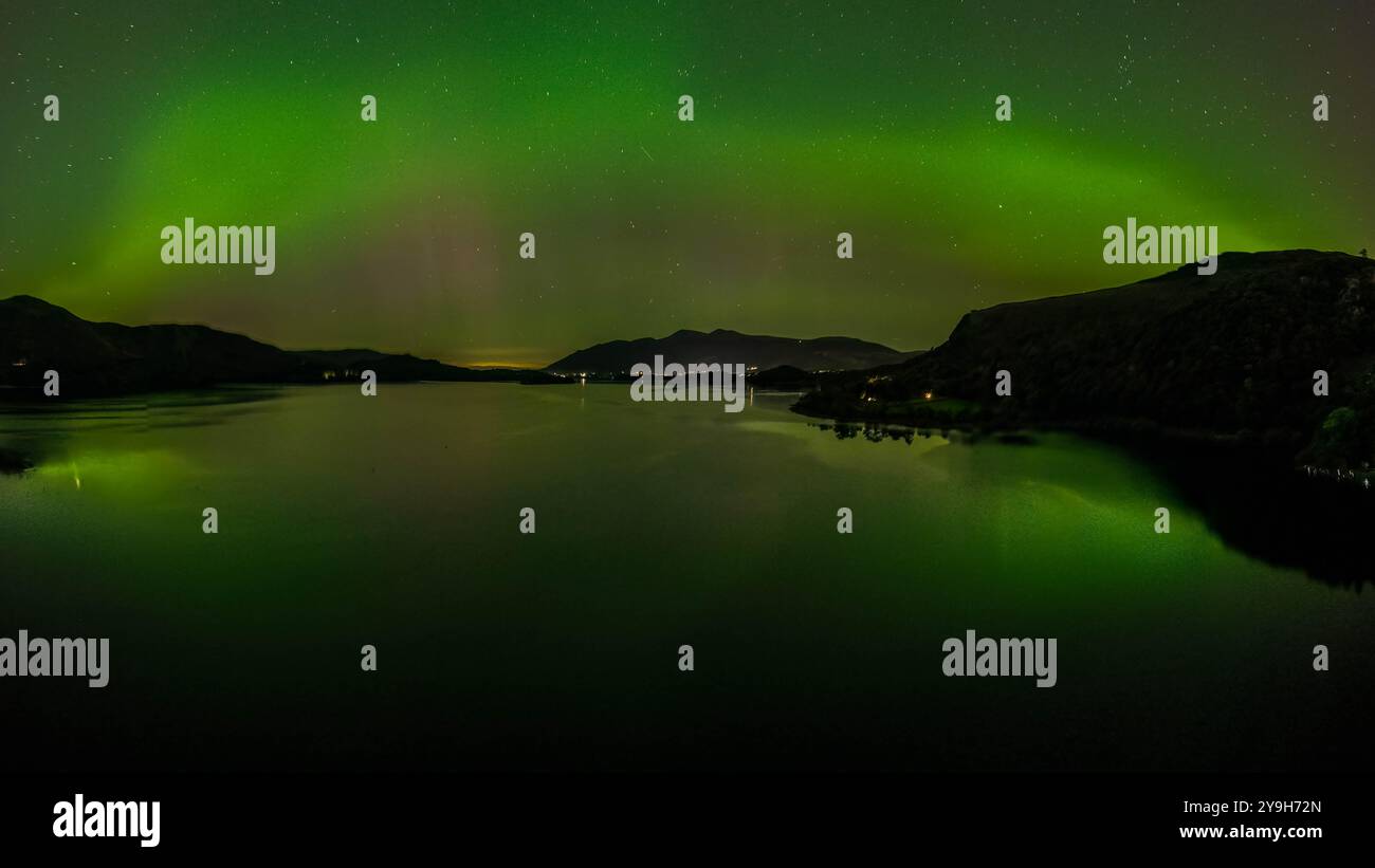 Keswick, UK. 10th Oct, 2024. *** EDITORS NOTE THIS PANO IS A STITCHED PHOTO OF MULTIPLE SHOTS *** Northern Lights also know as the Aurora Borealis shines over Derwent Water near, Keswick, Lake District, Cumbria, United Kingdom, 10th October 2024 (Photo by Mark Cosgrove/News Images) in Keswick, United Kingdom on 10/10/2024. (Photo by Mark Cosgrove/News Images/Sipa USA) Credit: Sipa USA/Alamy Live News Stock Photo