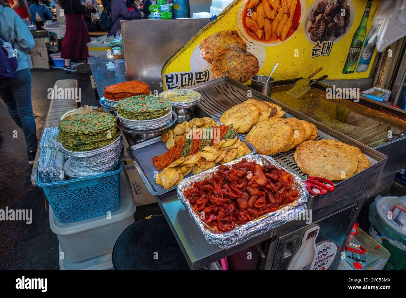 Seoul, South Korea - November 11, 2022 : shop and street food stall with many tourist at Gwangjang Market Stock Photo