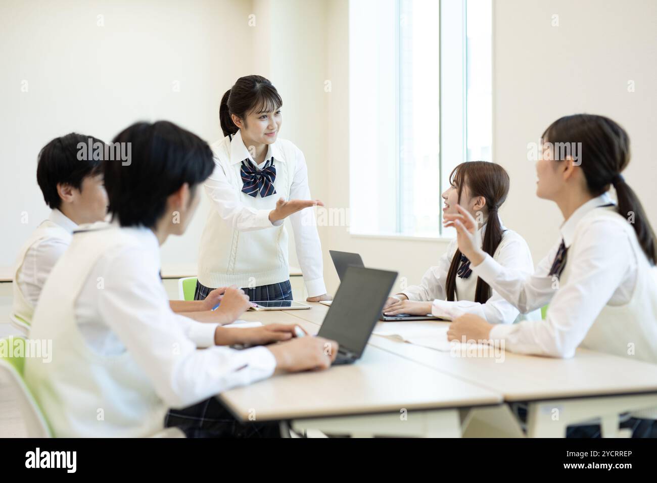 High school students having a group discussion Stock Photo