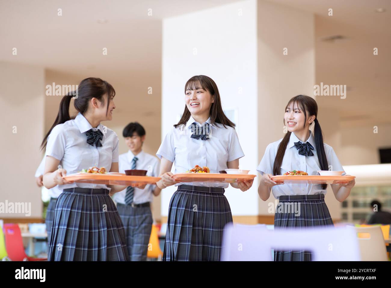 High school students eating in the student cafeteria Stock Photo