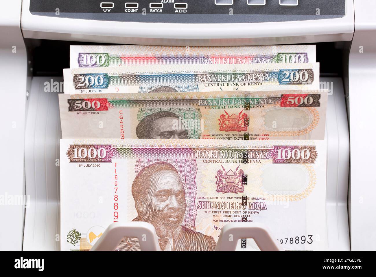 Kenyan money - shilling in the counting machine Stock Photo